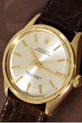 Rolex Oyster Perpetual SCOC 18K Gold gent's wristwatch with reeded index bezel