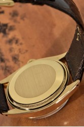 Rolex Oyster Perpetual SCOC 18Kt Gold Herrenuhr mit gerippter Lunette