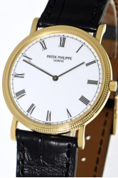 Patek Philippe "Clous de Paris" Calatrava as new 18k gold Gent's wristwatch