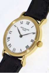 Patek Philippe Calatrava "Clous de Paris" Lady's 18K Gold wristwatch, ref. 4809, Box and Papers