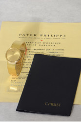 Patek Philippe "Clous de Paris" Calatrava as new 18k gold Gent's wristwatch with original papers