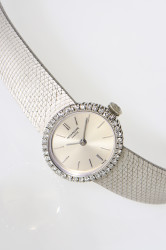 Patek Philippe 18Kt white gold diamond-set Lady wristwatch with with extract from the archives