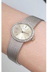 Patek Philippe 18Kt white gold diamond-set Lady wristwatch with with extract from the archives