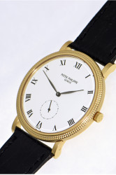 Patek Philippe Calatrava elegant 18K gold wristwatch Ref. 3919 "Clous de Paris" dekoration