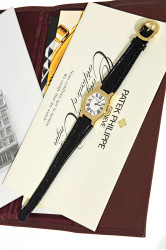 Patek Philippe Tonneau Gondolo attractive Lady's watch, Patek Philippe Certificate of Origin & original accessories
