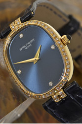 Patek Philippe Lady Ellipse mit Diamantbesatz, 18Kt Gold, Originalzertifikat