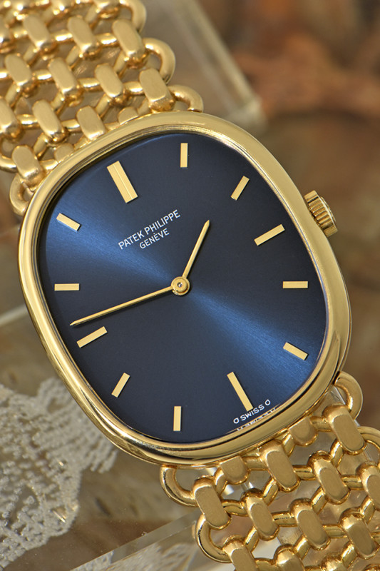 Patek Philippe Ellipse d'Or 18K Gelbgold-Herrenuhr mit elegantem 18Kt Goldarmband