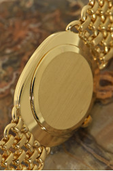 Patek Philippe Ellipse d'Or 18K Gelbgold-Herrenuhr mit elegantem 18Kt Goldarmband