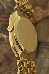 Patek Philippe Ellipse d'Or 18K Gelbgold-Herrenuhr mit elegantem 18Kt Goldarmband