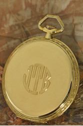 A rare Cartier Art Deco 18K Gold pocket watch, floral dekorated