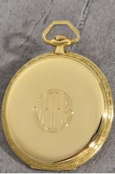 A rare Cartier 18K Gold pocket watch, floral dekorated
