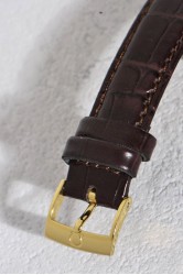 An elegant, as new OMEGA De Ville Prestige Tonneau Automatic Chronometer 18k gold gent's wristwatch